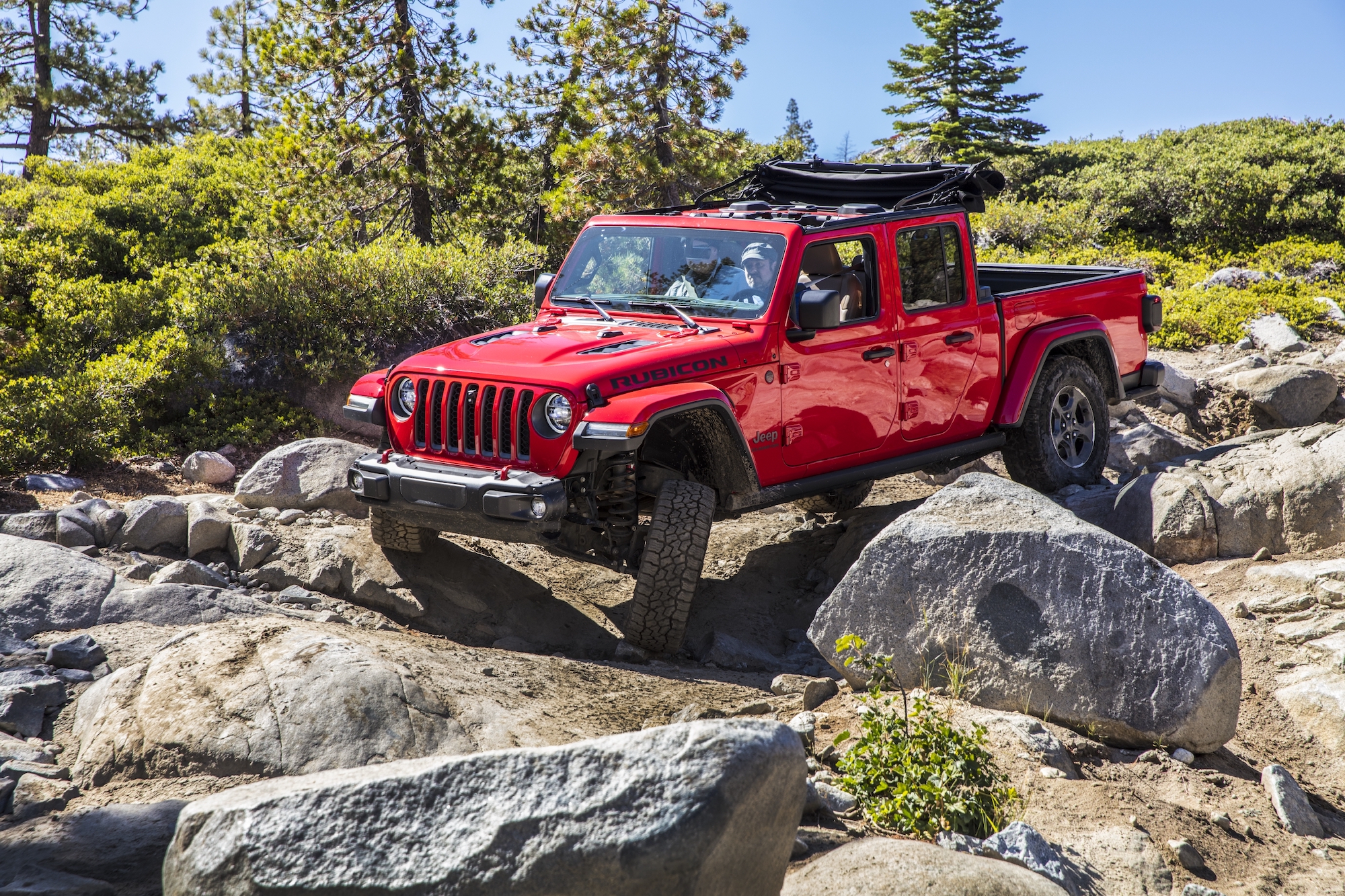 2020 Jeep Gladiator Rubicon front three-quarter articulation on rubicon trail action