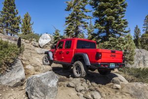 2020 Jeep Gladiator Rubicon rear three-quarter articulation on rubicon trail action