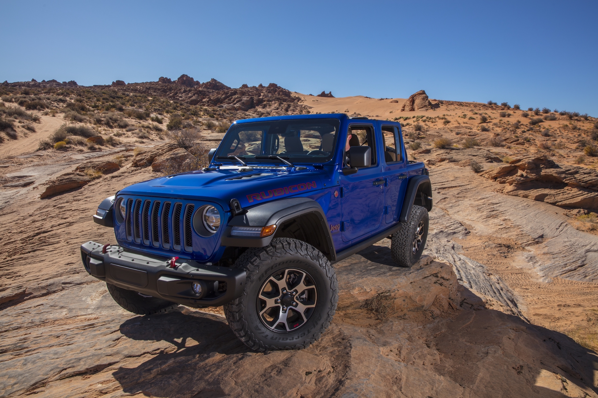 2020 Jeep Wrangler Rubicon EcoDiesel front three-quarter articulation off-road