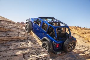 2020 Jeep Wrangler Rubicon EcoDiesel rear three-quarter off-road climb action